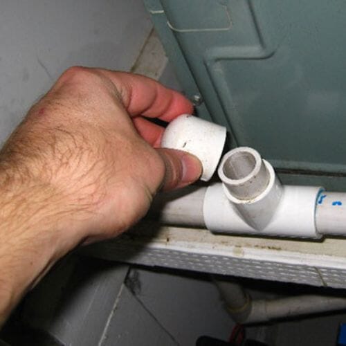 Professional AC Unit Drain Overflow Cleanup service underway at a property in Pembroke Pines, FL