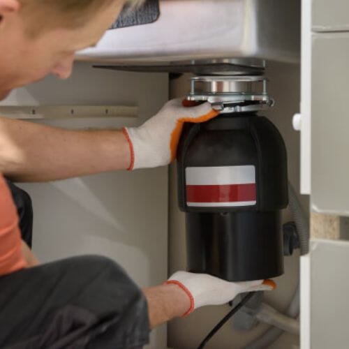 Professional Leaky Garbage Disposal Cleanup service underway at a property in Pembroke Pines, FL