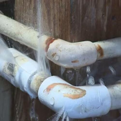 Professional water pipe break repair service underway at a property in Houston