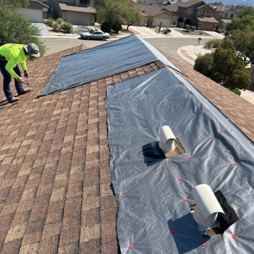 Professional emergency tarping service underway at a property in Pembroke Pines, FL