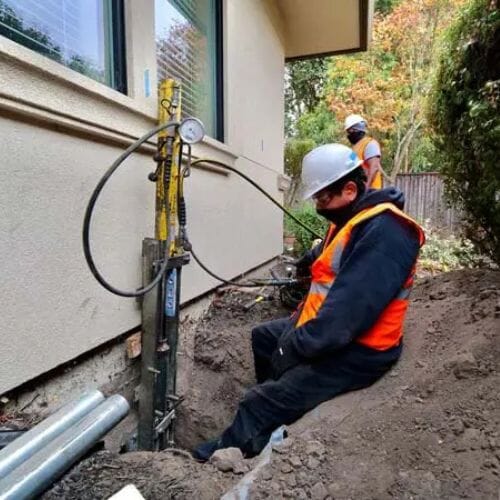 Professional foundation stabilization service underway at a property in Pembroke Pines, FL