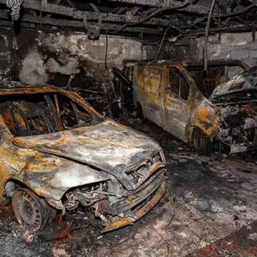 Professional GARAGE DAMAGE restoration underway at a property in Houston
