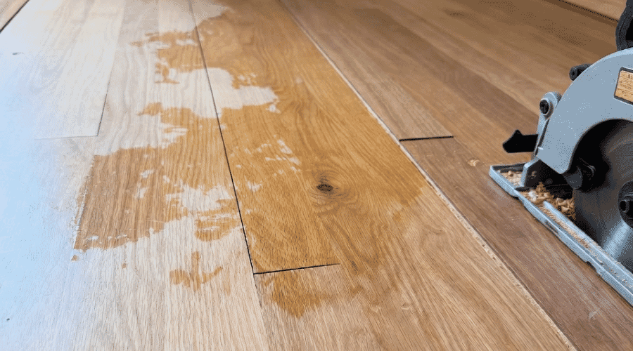 Professional hardwood floor water damage repair service underway at a property in Blanco, TX