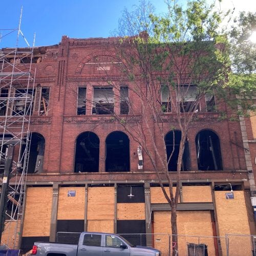 Professional historic commercial building restoration underway at a property in Houston