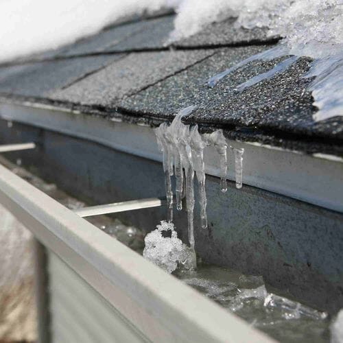 Professional ice dam removal and repair service underway at a property in Pembroke Pines, FL