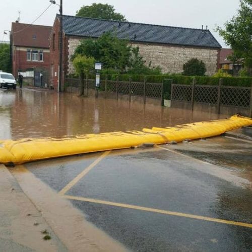 After results of sandbagging flood barrier installation project completed for a property in Pembroke Pines, FL