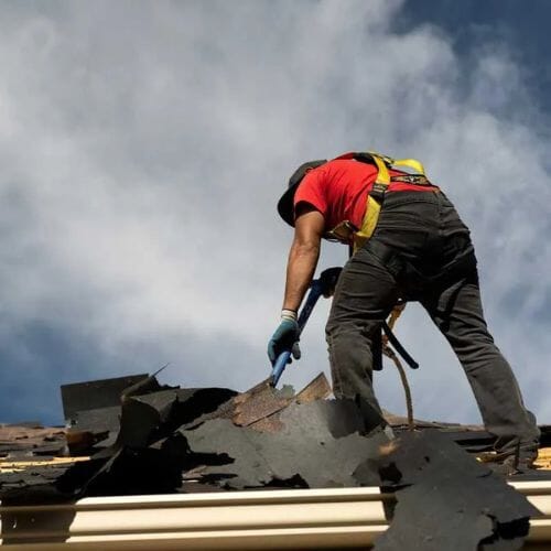 Professional wind damage repair service underway at a property in Pembroke Pines, FL